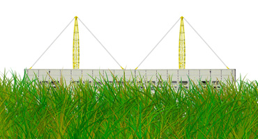 Pabrik di belakang rumput