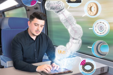 Orang bekerja menggunakan tablet di kereta dan menganimasikan lengan robot